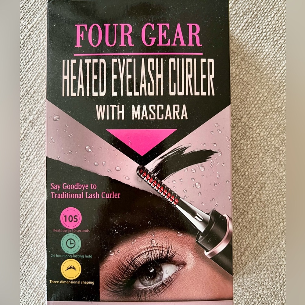 Heated eyelash curler with mascara